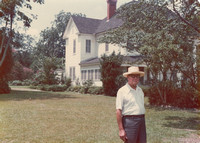 William in front of Camilla Home